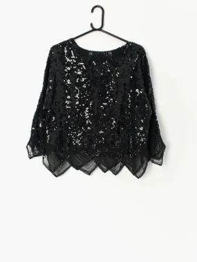 Vintage black sequin top with floral pattern and profiled hem – Medium / Large